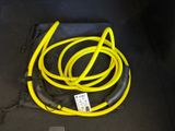 a yellow cord that is connected to a black bag
