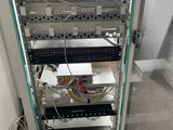 a rack with a lot of wires and wires attached to it