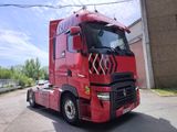 a red truck that is parked on the side of the road