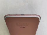 a close up of the back of a pink iphone 6g