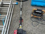a picture of a corded pole sawing machine and other tools