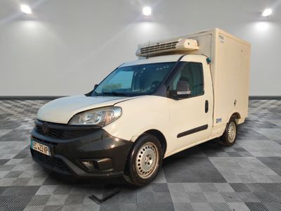 a picture of a white van parked in a room