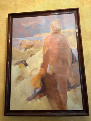 tableau représentant un homme se promenant sur une plage avec un chien