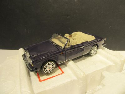 a toy car that is sitting on top of a box