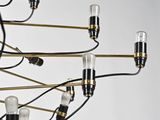 a close up of a chandelier with many lights hanging from it