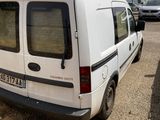 a white van that is parked in a parking lot