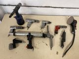 a lot of tools that are laying out on the floor