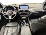 the interior of a car with a steering wheel, dashboard, and steering controls