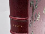 three books that are stacked on top of each other