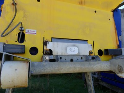 a close up of a yellow and blue train car