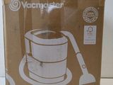 a cardboard box with a coffee maker inside of it