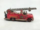 a toy fire truck with a ladder on the back