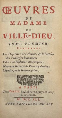 un vieux livre à l'écriture rouge posé sur une table