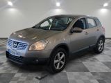 a picture of a silver nissan rav on a checkered floor