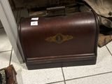 a suitcase that is sitting on the floor in the room