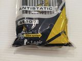 a close up of a plastic bag with a yellow tag on it