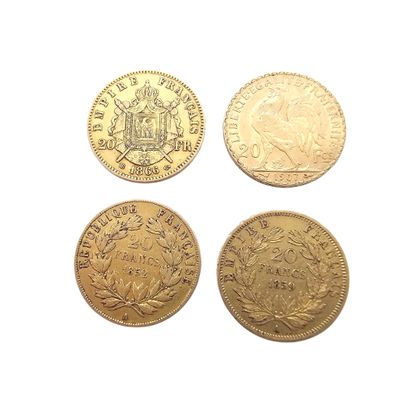 four different types of gold coins on a white surface