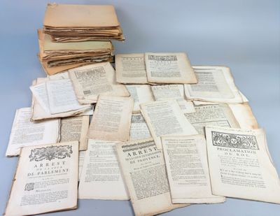 pile of old books sitting on top of each other on a table