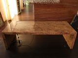 a marble table with a wine glass holder on top of it