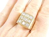 an image of a woman ' s hand with a diamond ring on it