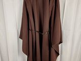 the coat is brown and has a belt on it