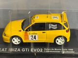 a yellow toy car in a clear display case