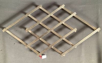 a picture of a wine rack made out of wood
