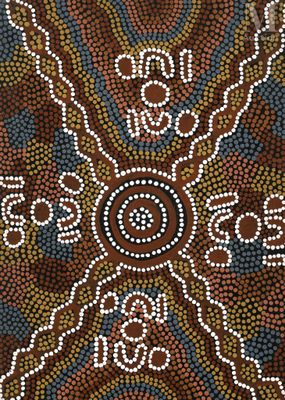 un gros plan sur une peinture à pois marron et bleus sur un mur