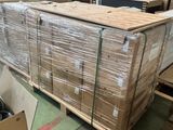 boxes and pallets are stacked on pallets in a warehouse