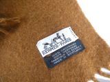 a label that says hermes paris on a scarf