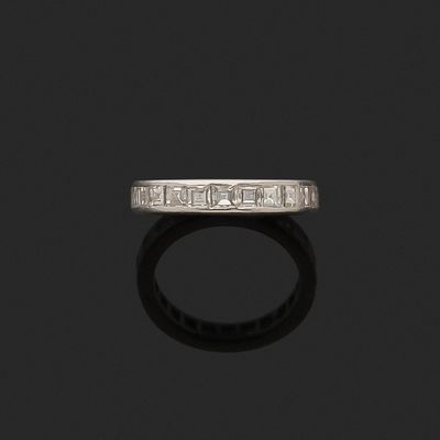 an art deco diamond half - eternity ring