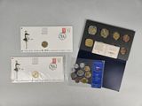 three different types of coins are on display on a table