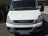 a white van that is parked in a parking lot