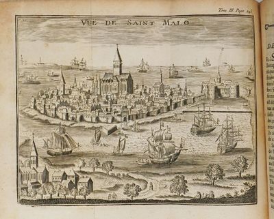 un vieux livre sur lequel figure l'image d'une ville