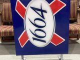 a close up of a sign on a stand in a room