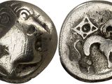 a close up of a coin with a horse on it