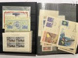 a book with a lot of different stamps on it