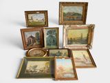 a lot of framed pictures on a white surface