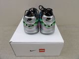 a pair of nike air force sneakers in a box