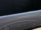 a close up of a box with a knife in it