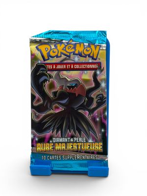 a close up of a box of pokemon trading cards on a white background