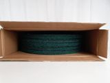 une boîte dont l'intérieur est recouvert d'un tissu vert