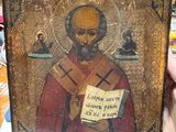 painting of a man holding a book in his hand