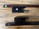 two different types of knives on a wooden table