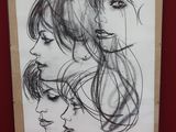 un dessin du visage d'une femme sur un morceau de papier