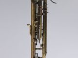 an old brass tuba with a brass bell on a white background