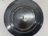a sink that has a metal bowl on it