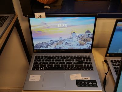 two laptops that are sitting on a table