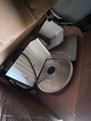 a toilet that is sitting in a box on the floor