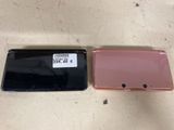 a couple of pink and black cases sitting next to each other